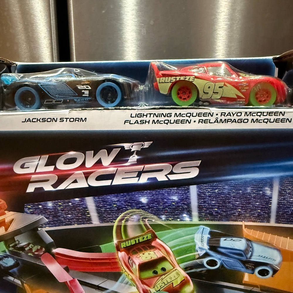 New in Box Disney and Pixar Cars Glow Racers
Launch & Criss-Cross Playset - Picture 2 of 9